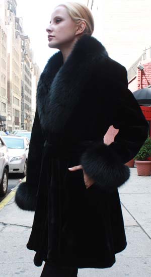 Marc Kaufman Furs Presents a black sheared mink fur stroller with black fox collar cuffs and belt from Marc Kaufman Furs New York,Argentina,United Kingdom,Austria,Denmark,Norway,Australia,Finland,Saudi Arabia,Oman,Kuwait,Jordan,Egypt