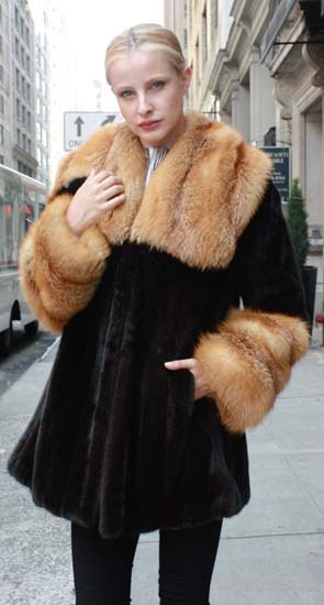 Marc Kaufman Furs Presents a blackglama mink fur stroller with red fox fur collar and red fox fur cuffs from Marc Kaufman Furs New York,Argentina,United Kingdom,Austria,Denmark,Norway,Australia,Finland,Saudi Arabia,Oman,Kuwait,Jordan,Egypt