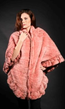 Marc Kaufman Furs Presents a pink knit mink fur cape with ruffles from Marc Kaufman Furs New York,Argentina,United Kingdom,Austria,Denmark,Norway,Australia,Finland,Saudi Arabia,Oman,Kuwait,Jordan,Egypt