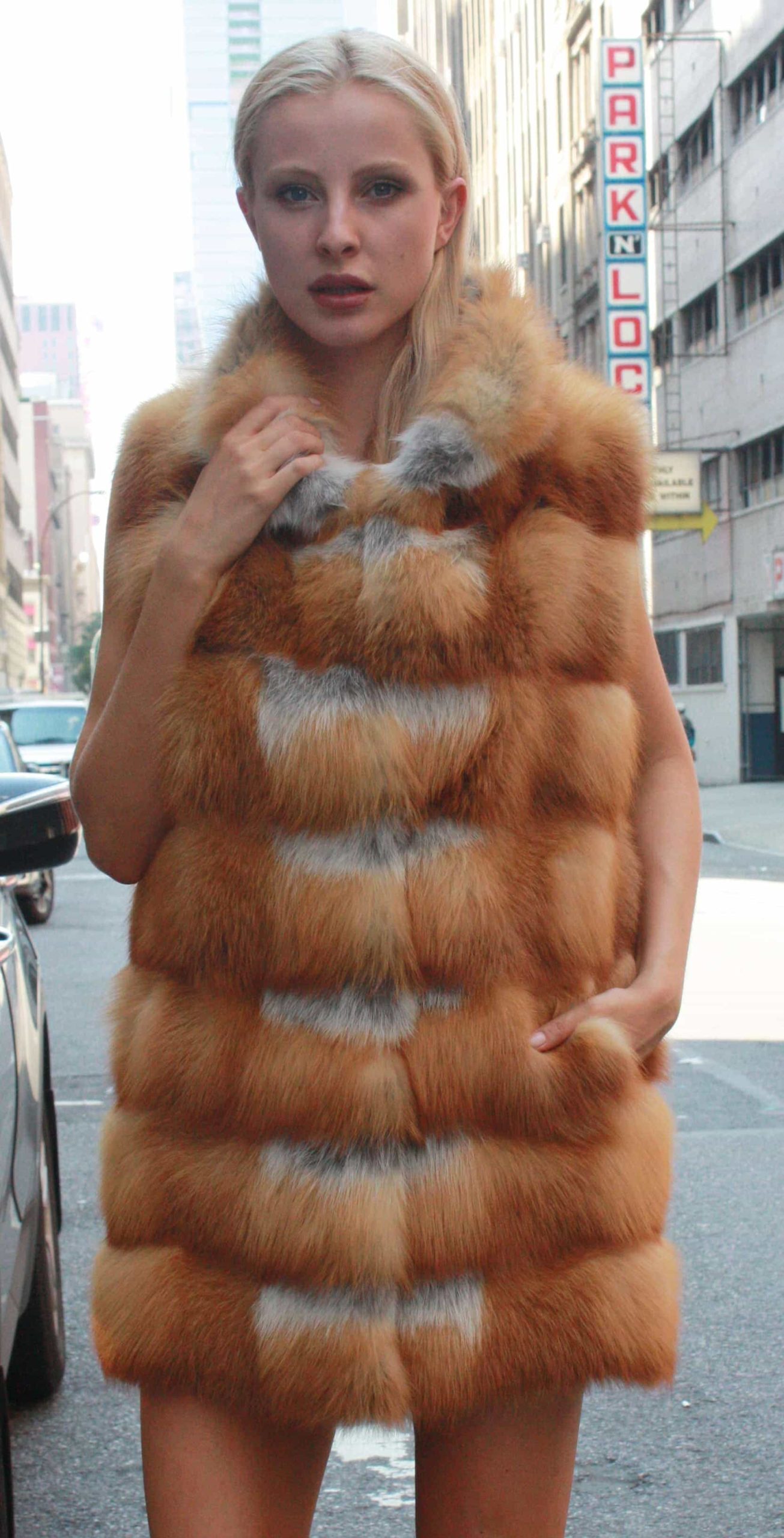 Marc Kaufman Furs Presents a red fox fur horizontal vest from Marc Kaufman Furs New York,Argentina,United Kingdom,Austria,Denmark,Norway,Australia,Finland,Saudi Arabia,Oman,Kuwait,Jordan,Egypt