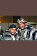 AJ Johnson Wearing Chinchilla Stroller Savior Bacote sporting a chinchilla hooded jacket