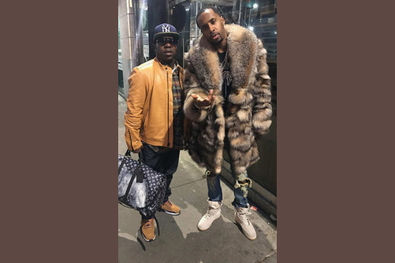 Celebrity Safaree Samuels Wearing Crystal Fox Fur Coat